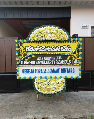 Papan Bunga Duka di Langkahan