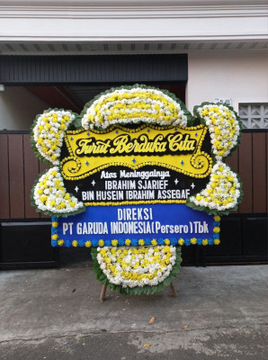Papan Bunga Duka di Langkahan